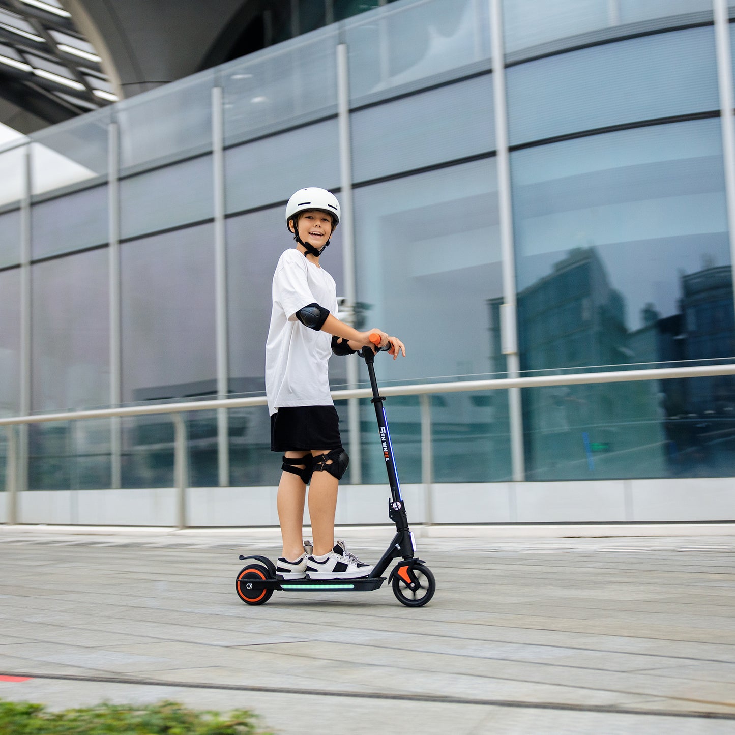 5TH WHEEL Kids Electric Scooter | 150W Rated Motor, 20 Mile Range, Adjustable Height Stem with Ambient Lighting System